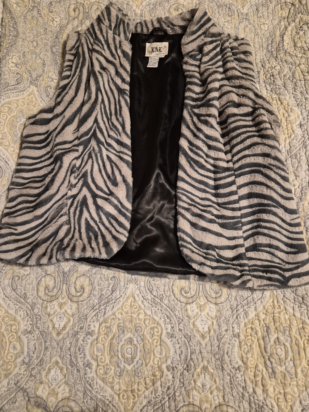 Live a Little Zebra-Print Faux Fur Vest in Gray and Black